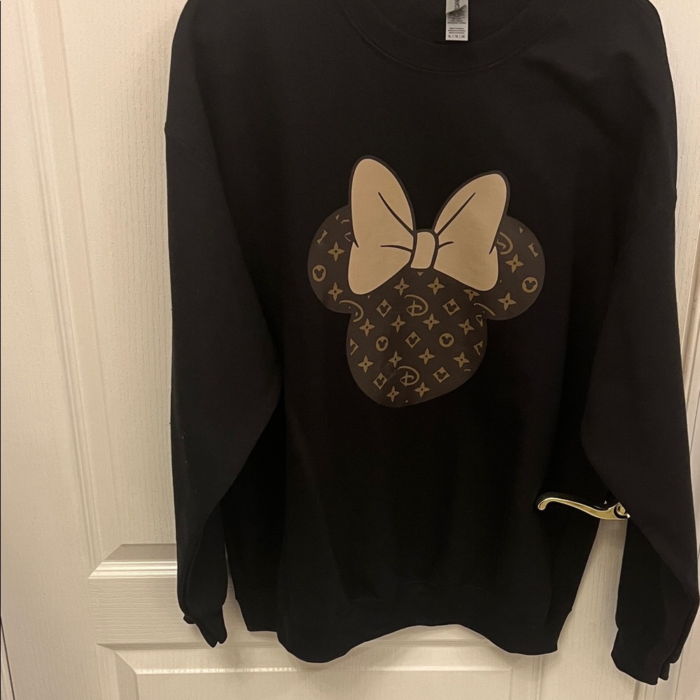 Fashion Black Sweatshirt with Tan Bow Design.
